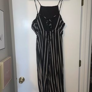 Spaghetti strap jumpsuit. Hits mid calf